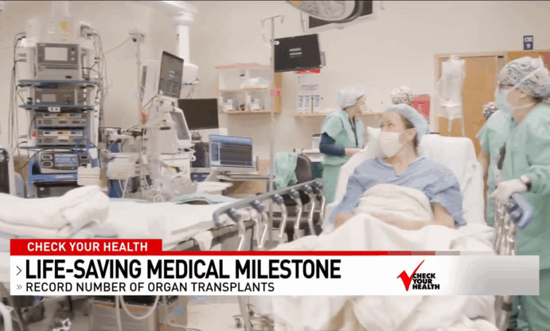 Program for transplant patients hold old hearts in hands