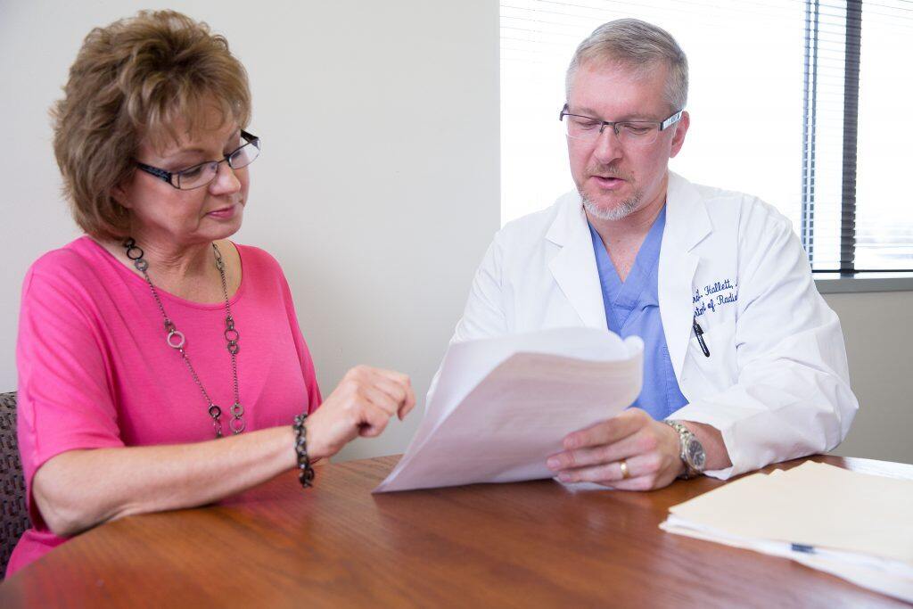 Do i continue to work with a primary healthcare provider while in a trial