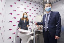 Flushing a toilet can release viral droplets what to know