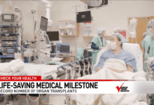 Program for transplant patients hold old hearts in hands