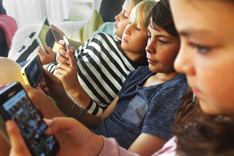 More than 2 hours of screen time can hurt kids brains